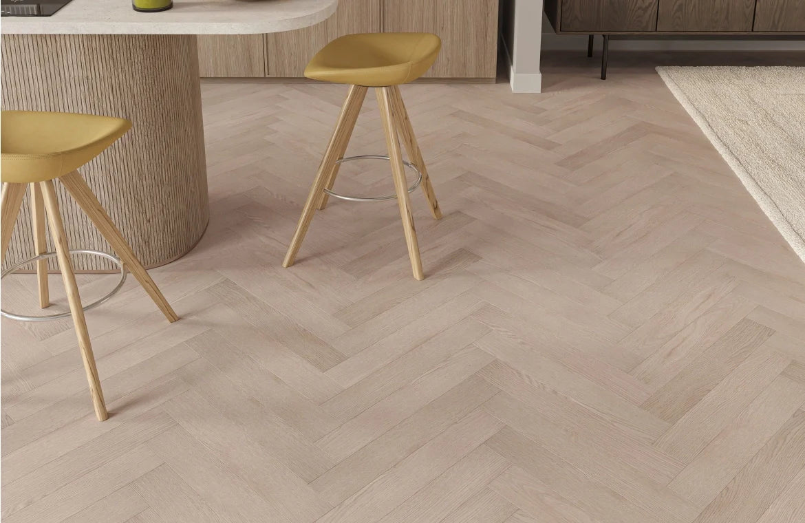 kingsley-8mm-whitford-oak-herringbone-laminate-flooring-1