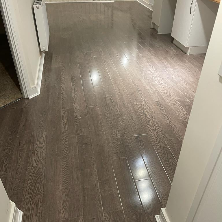 8mm-high-gloss-black-granite-laminate-flooring-1